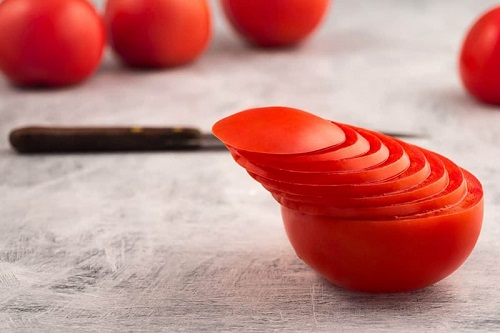 Cách làm trắng răng bằng cà chua cho bạn 2